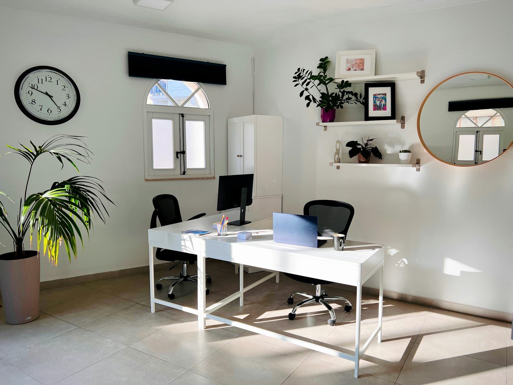 Pared-back desk by a window