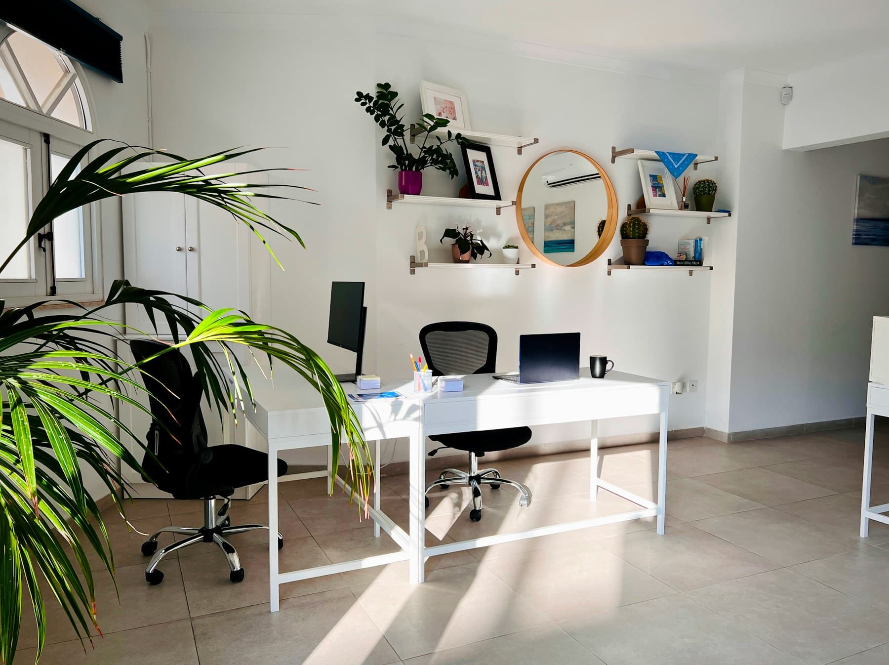 Minimal workspace by a window in soft natural light